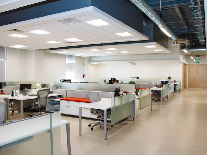 Open-plan office with desks and chairs prepared for a commercial relocation